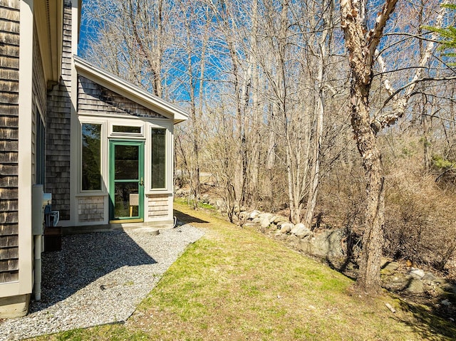 view of yard featuring a sunroom