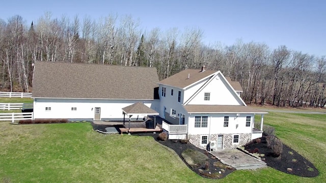 129 Williams Rd, Presque Isle, ME 04769 - back of property with fence, a wooden deck, and a lawn