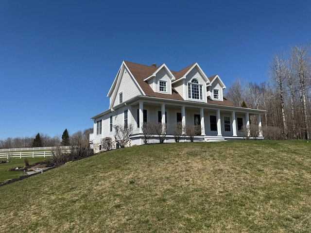 129 Williams Rd, Presque Isle, ME 04769 - farmhouse-style home featuring a chimney, fence, a porch, and a front yard