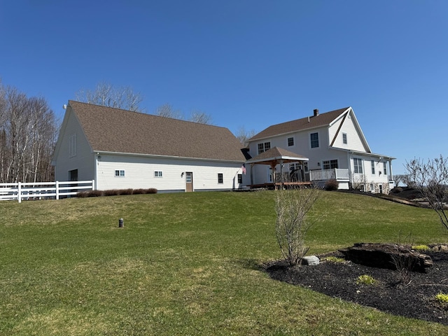 129 Williams Rd, Presque Isle, ME 04769 - back of property with fence, a gazebo, and a yard