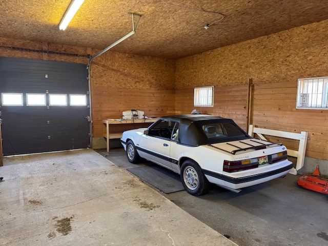 129 Williams Rd, Presque Isle, ME 04769 - garage featuring wood walls