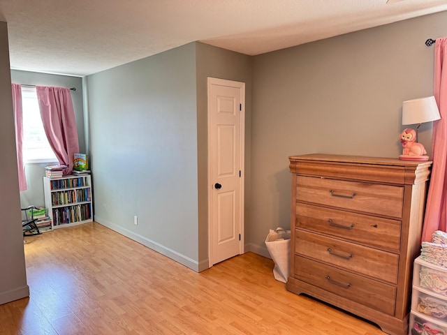 129 Williams Rd, Presque Isle, ME 04769 - bedroom featuring light wood finished floors and baseboards
