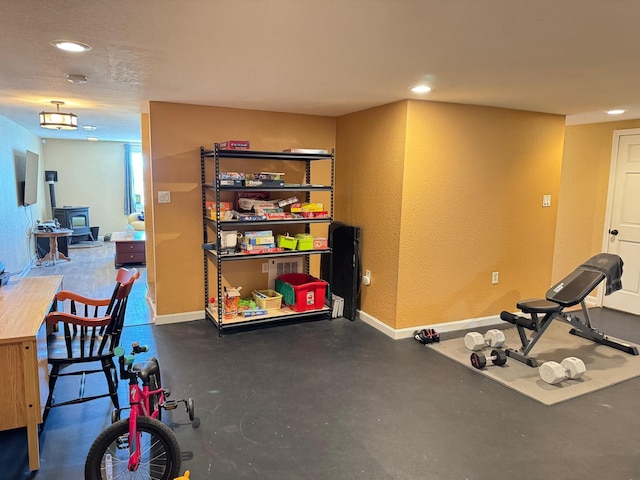 129 Williams Rd, Presque Isle, ME 04769 - exercise room with a textured wall, recessed lighting, and baseboards
