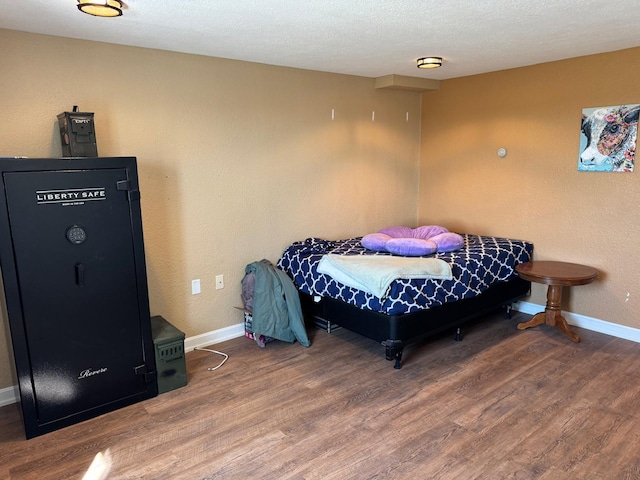 129 Williams Rd, Presque Isle, ME 04769 - bedroom featuring baseboards and wood finished floors