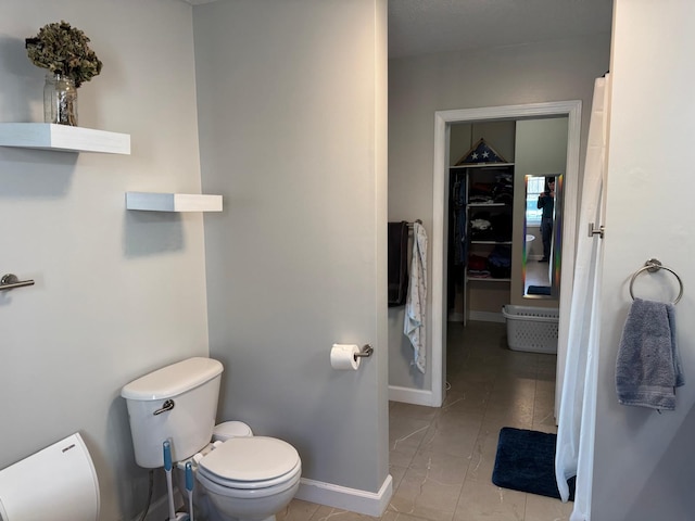 129 Williams Rd, Presque Isle, ME 04769 - full bathroom with baseboards and toilet
