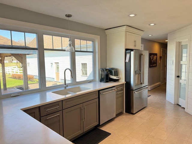 129 Williams Rd, Presque Isle, ME 04769 - kitchen with appliances with stainless steel finishes, a healthy amount of sunlight, recessed lighting, and a sink
