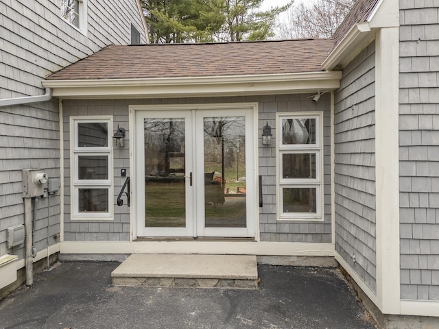 42 Ledge Hill Rd, Raymond, ME 04071 - entrance to property featuring french doors and roof with shingles