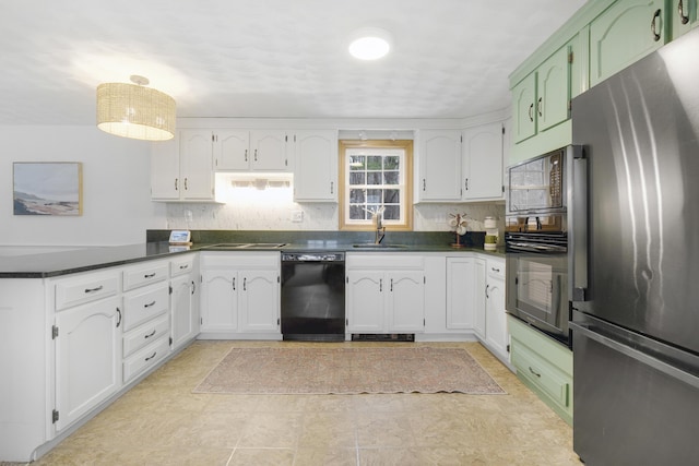 42 Ledge Hill Rd, Raymond, ME 04071 - kitchen with dark countertops, a sink, black appliances, a peninsula, and white cabinetry
