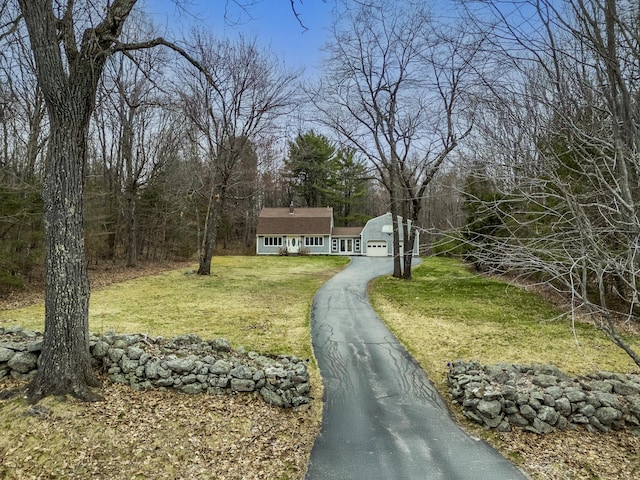 42 Ledge Hill Rd, Raymond, ME 04071 - view of front of house featuring a front yard