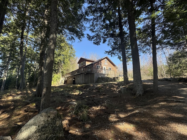 172 Alder Brook Ln, Waltham, ME 04605 - view of side of property with a deck