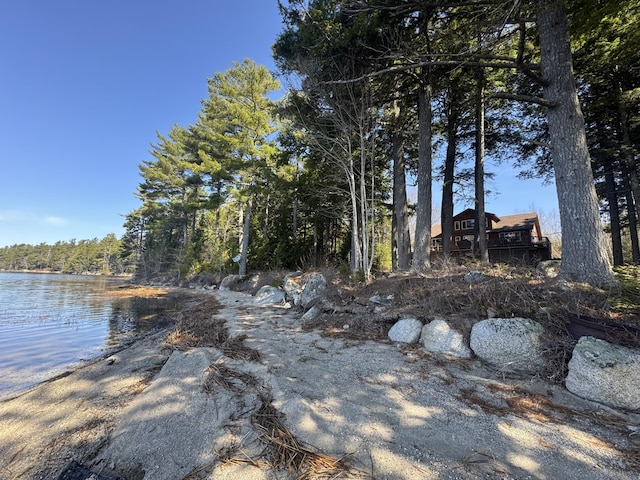 172 Alder Brook Ln, Waltham, ME 04605 - view of yard with a water view and a forest view