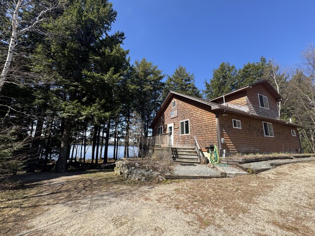 172 Alder Brook Ln, Waltham, ME 04605 - view of home's exterior featuring a water view