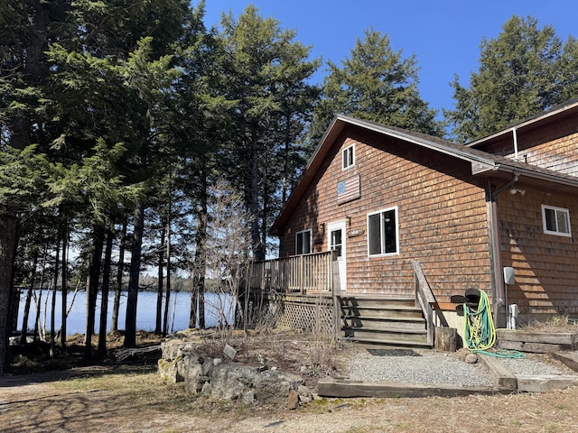 172 Alder Brook Ln, Waltham, ME 04605 - view of home's exterior featuring a deck with water view