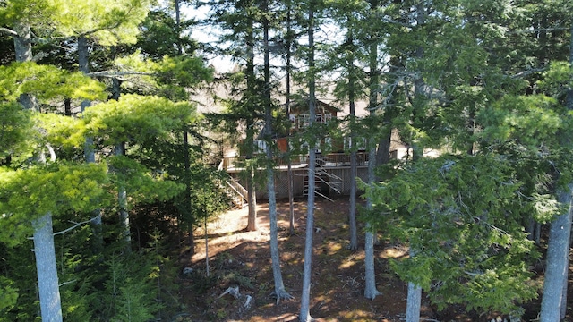 172 Alder Brook Ln, Waltham, ME 04605 - view of yard with stairway and a wooden deck