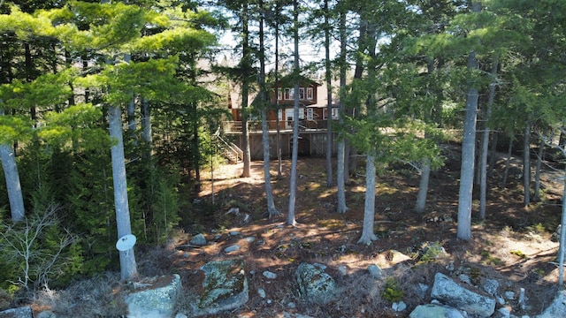 172 Alder Brook Ln, Waltham, ME 04605 - view of yard featuring a deck and stairway