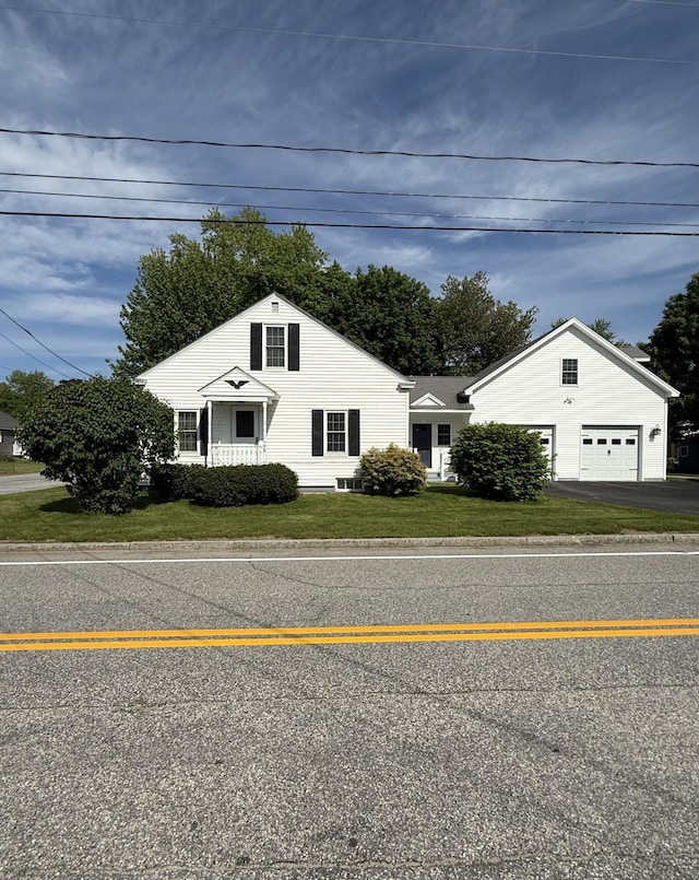 96 Rideout Ave, Lewiston, ME 04240 - view of front of property with driveway, a front yard, and a garage
