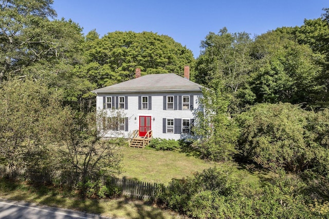 507 State Route 32nd Rte, Bristol, ME 04554 - colonial-style house with a chimney, a forest view, and fence