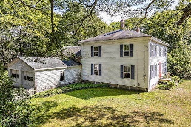 507 State Route 32nd Rte, Bristol, ME 04554 - back of house featuring a chimney, a yard, and view of wooded area