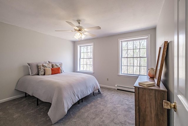 bedroom with carpet floors, baseboards, a ceiling fan, and a baseboard heating unit