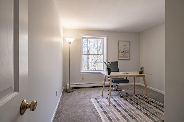 carpeted office space with baseboards and baseboard heating
