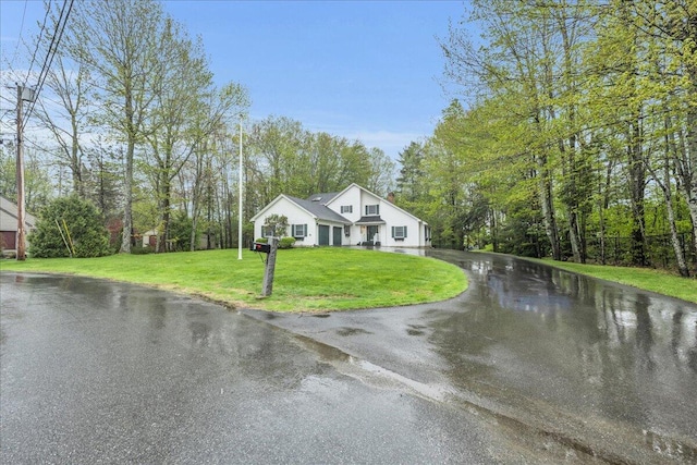 17 Fenton Way, Bangor, ME 04401 - view of front of house featuring driveway and a front yard