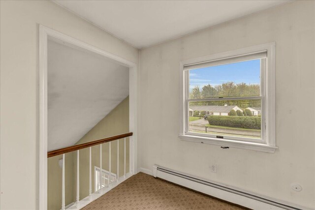 17 Fenton Way, Bangor, ME 04401 - carpeted empty room with a baseboard heating unit