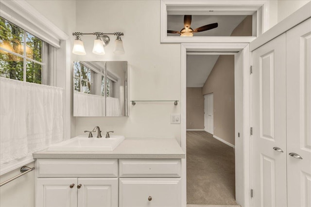 17 Fenton Way, Bangor, ME 04401 - bathroom featuring vanity, a ceiling fan, and baseboards