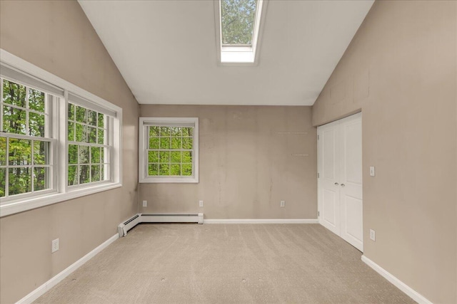 17 Fenton Way, Bangor, ME 04401 - carpeted empty room with a baseboard heating unit, lofted ceiling, and baseboards