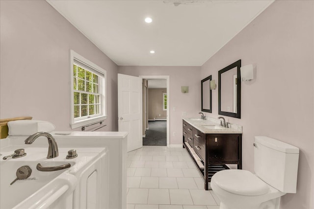 17 Fenton Way, Bangor, ME 04401 - full bathroom with toilet, double vanity, a baseboard radiator, tile patterned floors, and recessed lighting