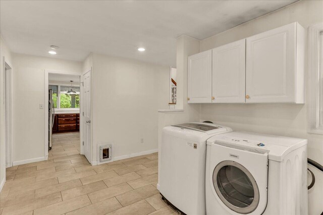 17 Fenton Way, Bangor, ME 04401 - laundry area featuring cabinet space, washing machine and clothes dryer, baseboards, recessed lighting, and light tile patterned floors