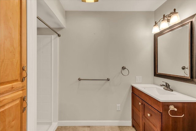 17 Fenton Way, Bangor, ME 04401 - full bathroom featuring vanity, a shower, and baseboards