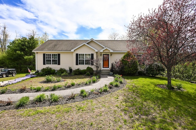 25 Ireland Dr, Berwick, ME 03901 - ranch-style house featuring a front yard and a shingled roof