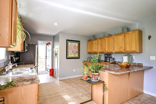 25 Ireland Dr, Berwick, ME 03901 - kitchen with a sink, baseboards, a peninsula, recessed lighting, and light tile patterned floors