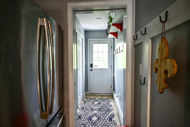 25 Ireland Dr, Berwick, ME 03901 - doorway featuring light tile patterned floors and baseboards