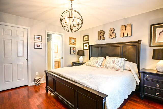 25 Ireland Dr, Berwick, ME 03901 - bedroom featuring a chandelier, dark wood-style floors, baseboards, and connected bathroom