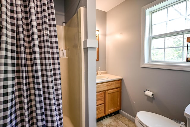25 Ireland Dr, Berwick, ME 03901 - full bath featuring toilet, a shower with curtain, vanity, baseboards, and tile patterned flooring