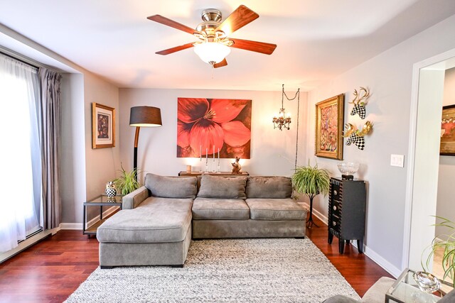 25 Ireland Dr, Berwick, ME 03901 - living room featuring dark wood-type flooring, ceiling fan, and baseboards