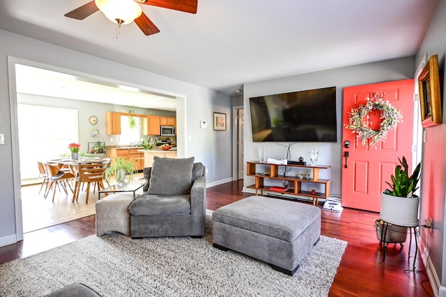 25 Ireland Dr, Berwick, ME 03901 - living area with a ceiling fan and dark wood-style flooring