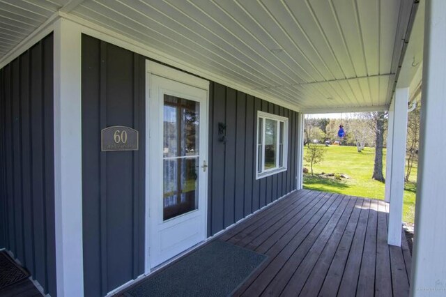 60 St John Rd, Fort Kent, ME 04743 - porch featuring a lawn