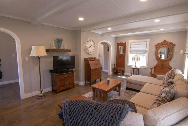60 St John Rd, Fort Kent, ME 04743 - living room with arched walkways, beamed ceiling, baseboards, wood finished floors, and recessed lighting