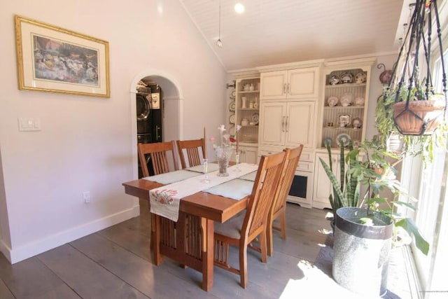 60 St John Rd, Fort Kent, ME 04743 - dining space with arched walkways, lofted ceiling, and baseboards