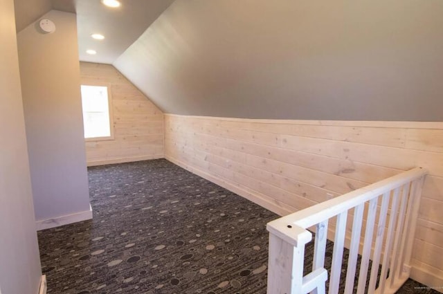 60 St John Rd, Fort Kent, ME 04743 - bonus room with vaulted ceiling, wooden walls, recessed lighting, and carpet