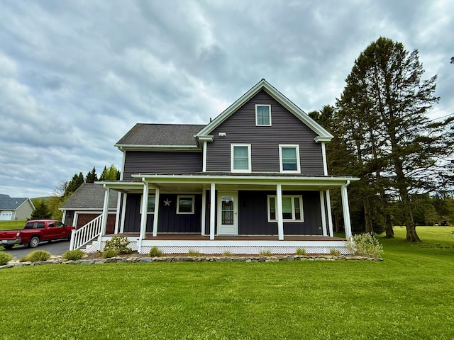 60 St John Rd, Fort Kent, ME 04743 - farmhouse-style home featuring a porch, board and batten siding, and a front yard