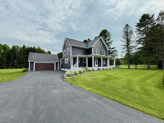 60 St John Rd, Fort Kent, ME 04743 - view of front of property featuring covered porch, an outbuilding, a chimney, and a front lawn