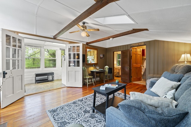 19 Pond View Way, Casco, ME 04015 - living area featuring wood finished floors, ceiling fan, and wooden walls