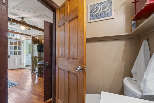 19 Pond View Way, Casco, ME 04015 - bathroom with toilet, a ceiling fan, wood finished floors, and vaulted ceiling