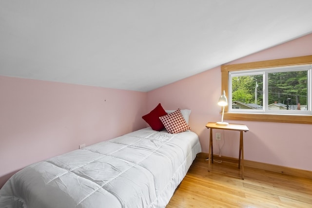 19 Pond View Way, Casco, ME 04015 - bedroom featuring vaulted ceiling, wood finished floors, and baseboards