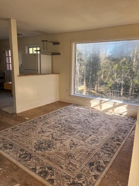 interior space featuring baseboards
