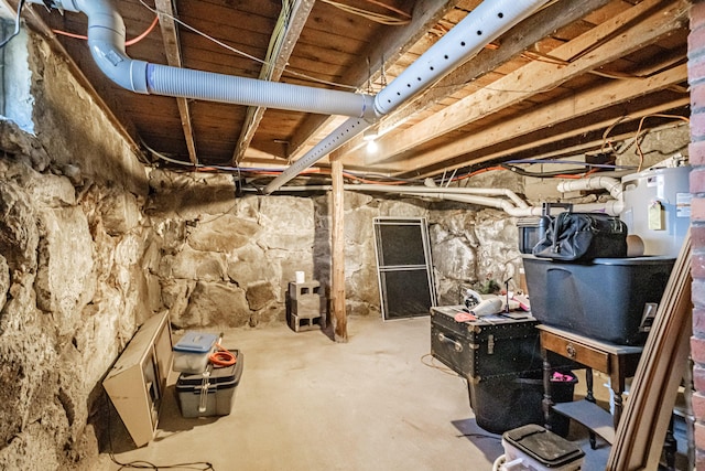 unfinished basement with water heater