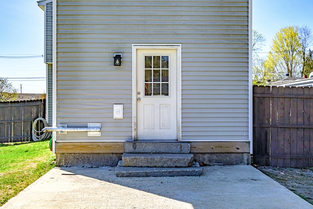 property entrance with fence